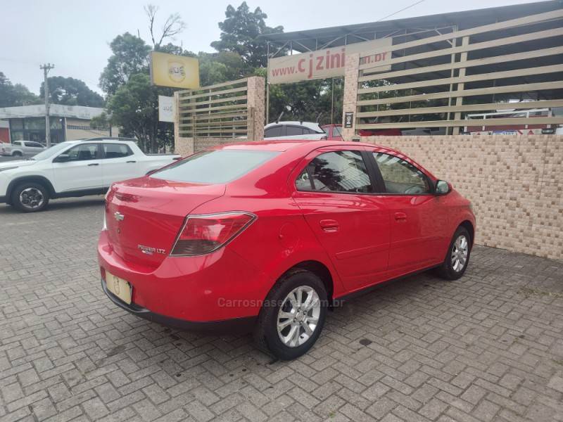 CHEVROLET - PRISMA - 2015/2016 - Vermelha - R$ 54.900,00