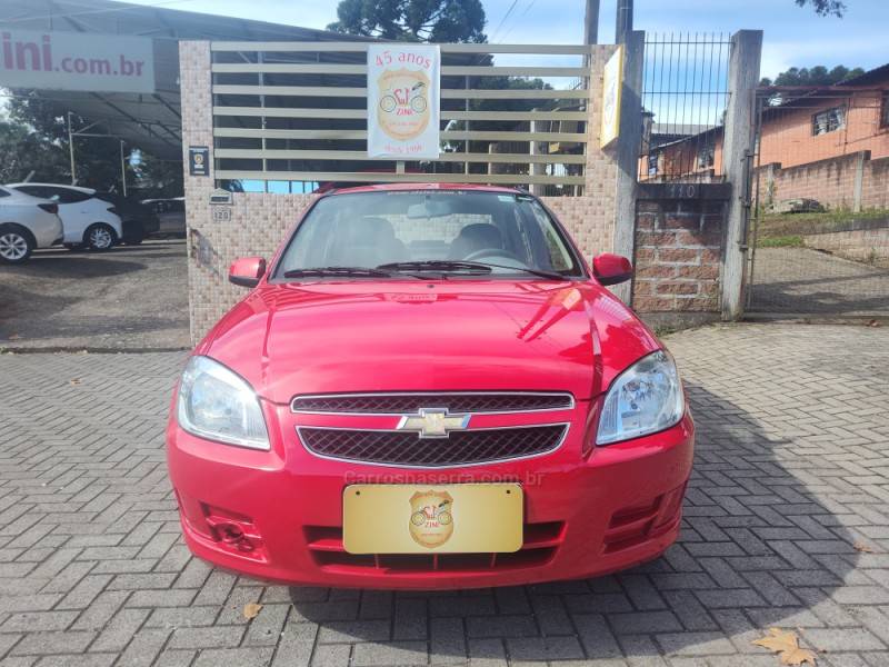 CHEVROLET - PRISMA - 2011/2012 - Vermelha - R$ 29.900,00