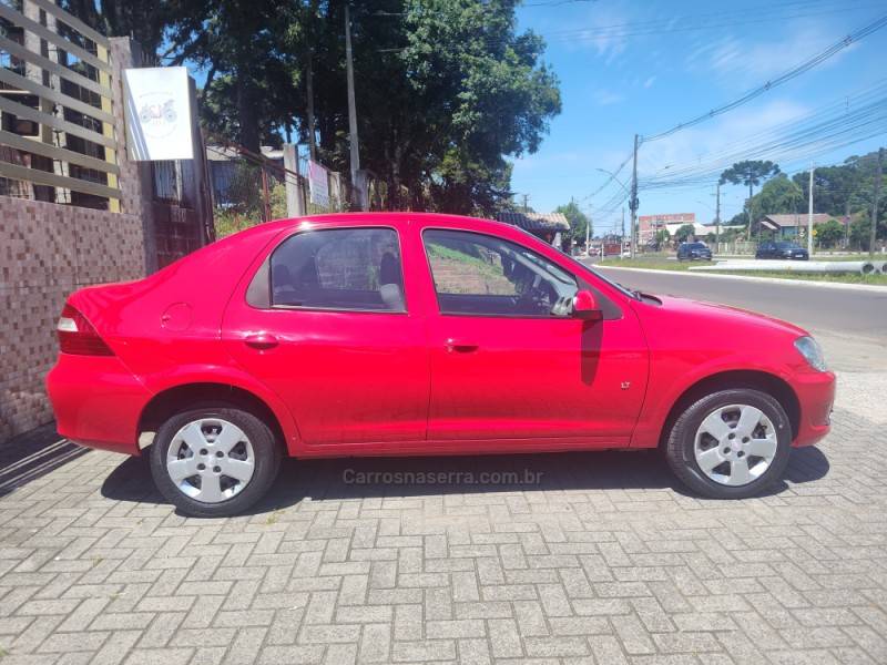 CHEVROLET - PRISMA - 2011/2012 - Vermelha - R$ 29.900,00