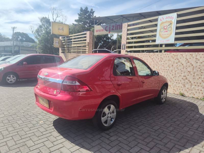 CHEVROLET - PRISMA - 2011/2012 - Vermelha - R$ 29.900,00
